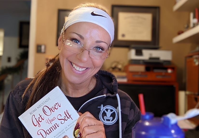 Coach Laura with book